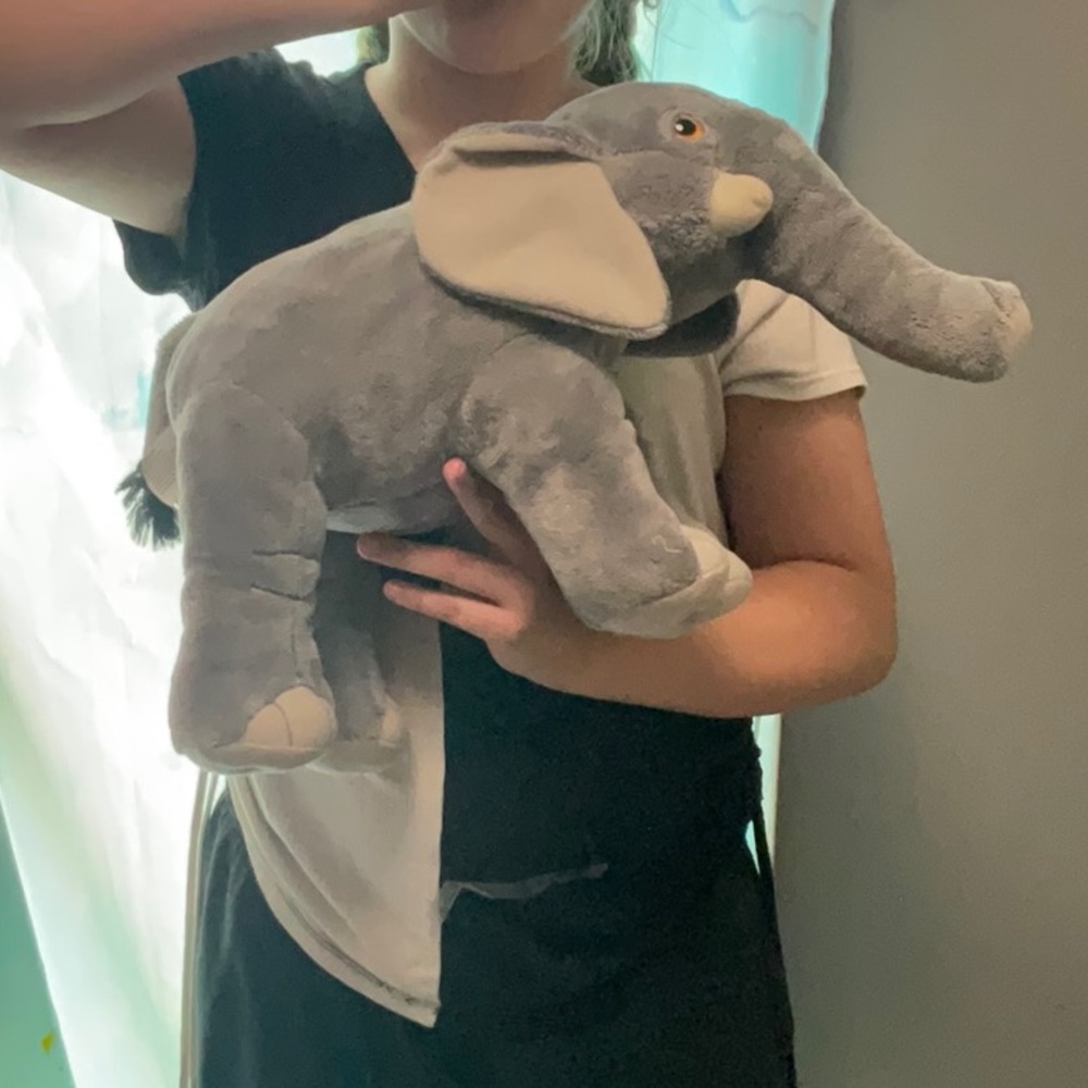 A normal sized plush elephant suitable for cuddling in your bedroom